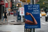 Pharmacies are urging people to get their flu shots. Is it too early?