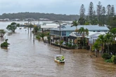 Three killed after torrential rain and flash flooding hits Australia