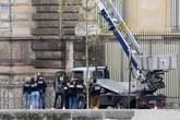 Louvre thieves filmed making slow getaway after whirlwind museum heist