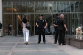 Staff return to 345 Park Avenue one week after New York mass shooting