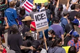 ‘Chains around my waist and feet’: Inside a Trump ICE detention centre