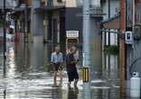 Japan under flood alert after record rainfall even as Shanshan weakens