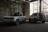 Bezos backs EV pick-up but radio, back seats will cost extra