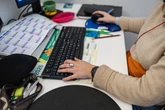 Women more likely to work in jobs impacted by AI, report warns