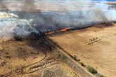 Holiday hotspot issued ‘dangerous threat’ warning as wildfire rages