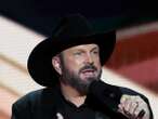 Garth Brooks denies rape claims and says accuser wanted ‘hush money’