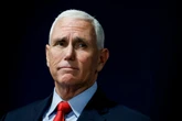 Mike Pence praises Jan 6 defendant for refusing to take Trump’s pardon