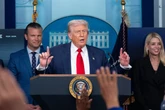 The Latest: National Guard troops arrive in Washington DC as Trump’s federal takeover begins