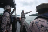 At least 14 missing after boat carrying Indonesian migrants capsizes