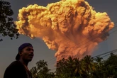 Flights suspended after massive Indonesia volcano eruption – live