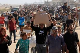 Gaza aid chaos as crowds surge and Israeli troops fire warning shots