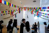 China censors Hong Kong and Uyghur art with black paint, blank screens
