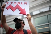 Tesla worker says he was fired after setting up anti-Elon Musk website