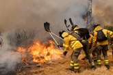 Spain adds 500 troops to battle fires as country bakes under heatwave