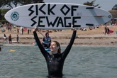 Surfers to stage ‘paddle out’ protest over ‘broken’ water system