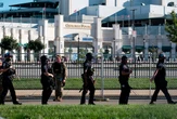 Kentucky police officer charged with beating kneeling protester