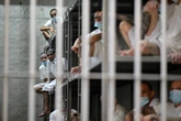 Venezuelan at CECOT prison say they were raped and beaten, report says