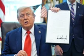 A look at Trump’s signature over the years amid Epstein scandal