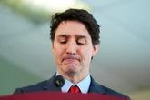 Trudeau tears up as he makes pledge to Canadian people amid trade war