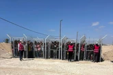 US contractors say their colleagues are firing live ammo as Palestinians seek food in Gaza