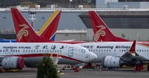 Boeing Reports Smaller Loss but Trade War Threats Loom