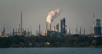 Exxon and Chevron Report Lower Profits While Girding for Tariffs