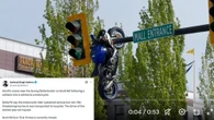 A Suzuki Superbike Collided With A BMW And Ended Up Dangling From A Traffic Light