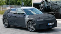 2026 Genesis GV60 Spied With New Widescreen Display, Sportier Steering Wheel