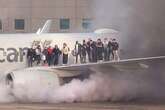 American Airlines plane catches fire