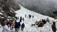 Dozens rescued from metal containers after deadly avalanche in India