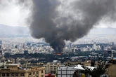 Iran state broadcaster building ablaze after Israeli airstrike, resumes transmission hours later