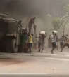 Benue youths caught on camera looting cement truck engulfed by fire