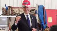 US election: Joe Biden seen wearing Trump’s MAGA cap