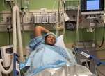 Omotola Jalade in hospital bed, battles life threatening illness [VIDEO]