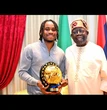 Lookman presents CAF POTY award to Tinubu in Lagos 