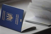 НАБУ викрило схеми із паспортами: чиновник мав прибуток від використання держсимволів