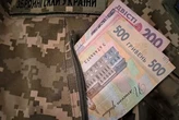 Хрещений батько загиблого воїна привласнив виплату: що вирішив суд