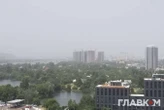 Навіть сонця не видно: густий смог накрив Київ (фоторепортаж)