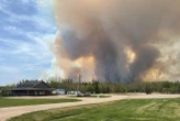 Le Canada en proie aux incendies : deux morts pris au piège dans leur maison, un millier d’évacués