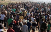Gaza : des milliers de personnes se précipitent sur un centre de distribution d’aide humanitaire