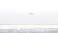 Barco fantasma entre brumas en Barcelona