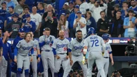 Los Dodgers de Los Angeles hacen historia al revalidar el título de beisbol en un partido épico