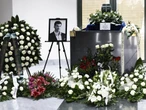 Poruszający widok Ostatnie pożegnanie Macieja Mindaka. Skromna urna i morze białych kwiatów na pogrzebie