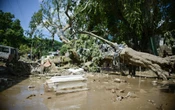 Suman 80 los muertos por lluvias e inundaciones en México