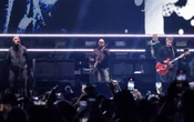 El guitarrista de Oasis Paul Arthurs anuncia que padece cáncer y hará un parón en la gira
