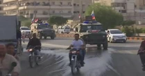 Russian troops moving into areas once controlled by US-backed Kurds