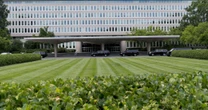 Woman shot after failing to stop at CIA headquarters gate, sources say