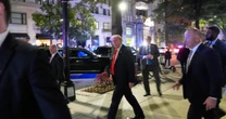 Trump greeted by protesters in D.C. restaurant but cheers outside