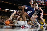 NCAA tourney star Braylon Mullins decides to chase national title at UConn instead of heading to NBA