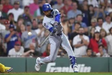 Dodgers' Mookie Betts rejoins team Saturday after death in family; pinch hits and strikes out